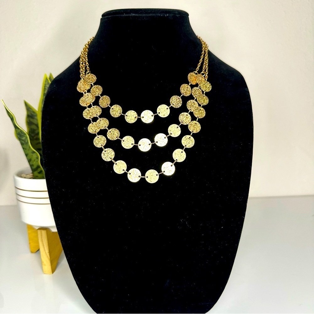 Gold tone multi layer necklace